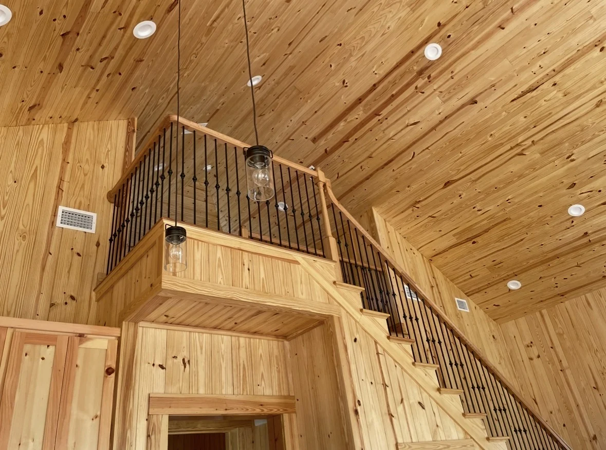 Custom wood interior staircase and loft